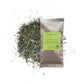 Organic Sencha Midori pouch displayed beside the loose tea leaves